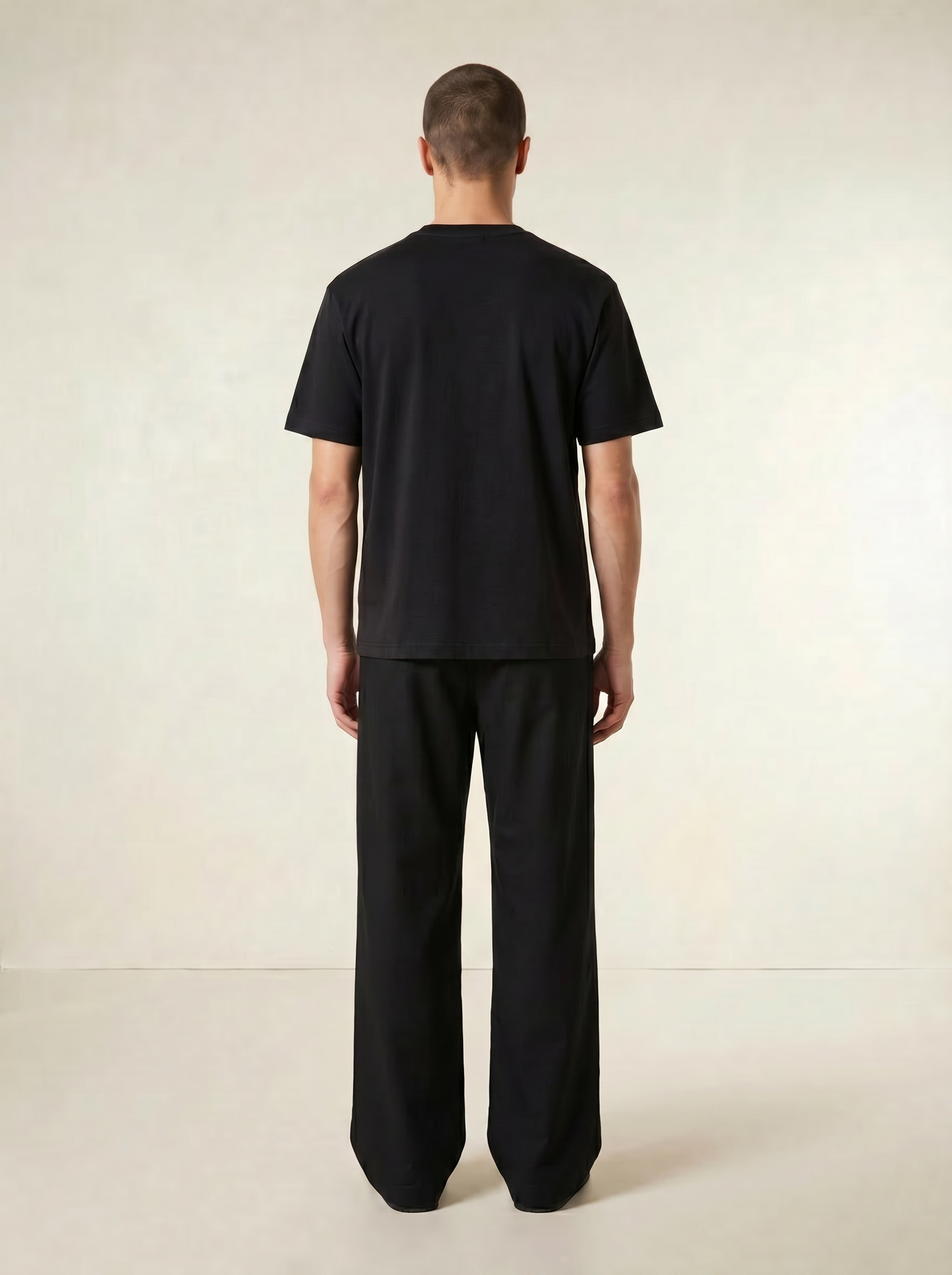men model posing wearing clean weave in black