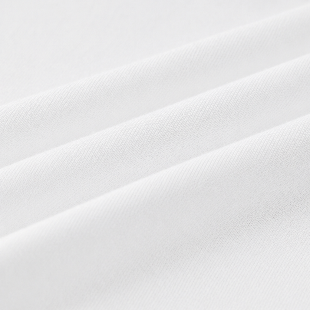 Close-up of white fabric with folds