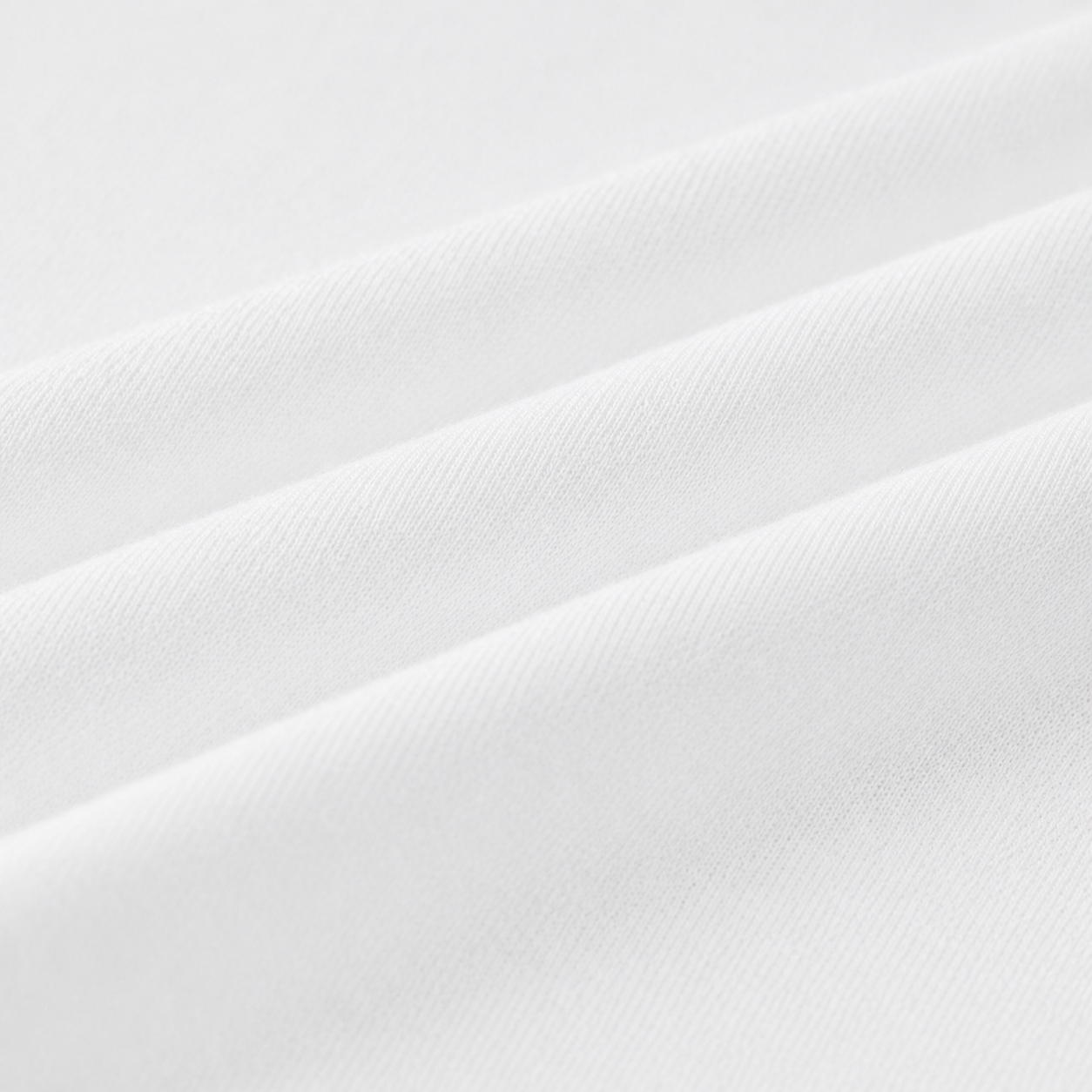 Close-up of white fabric with folds