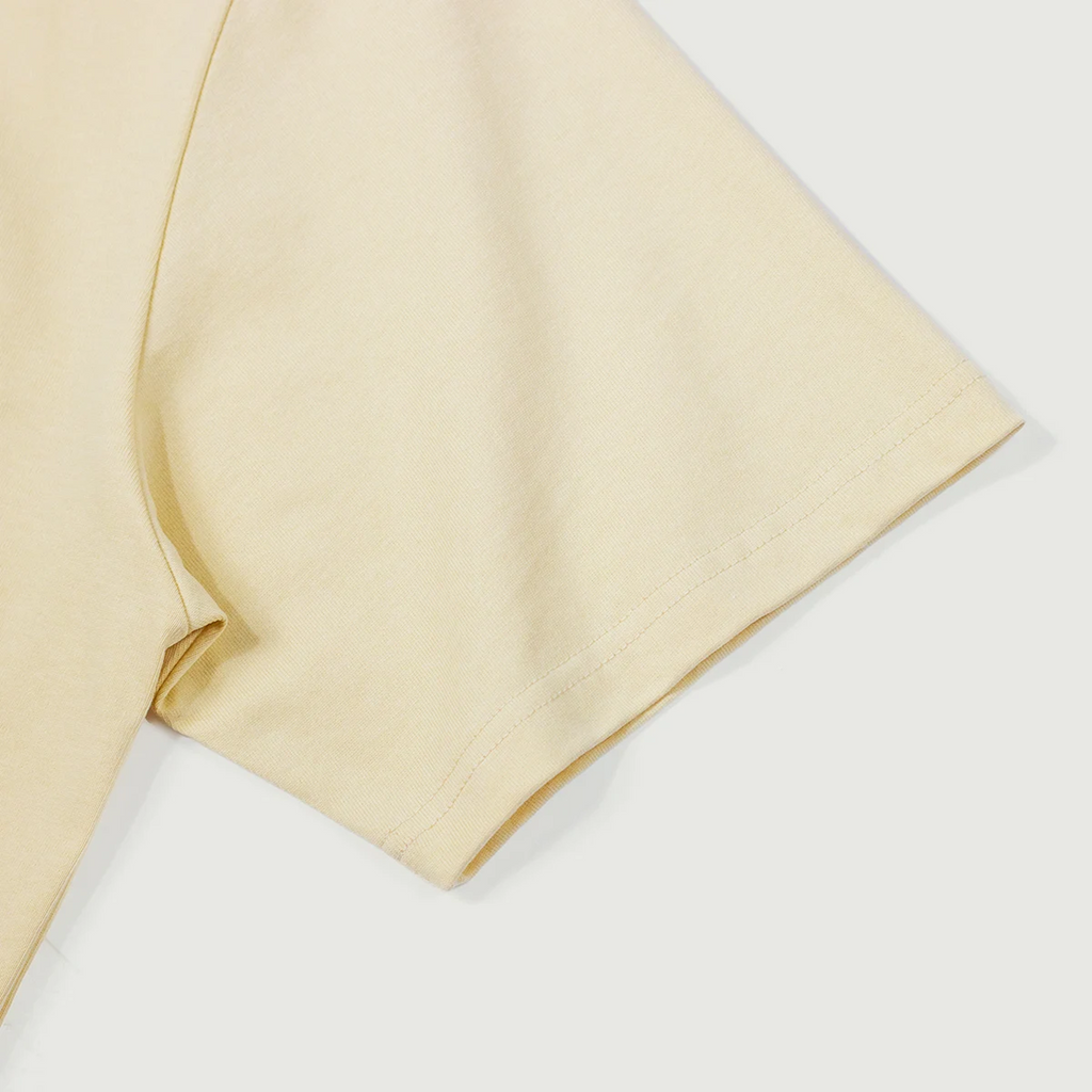 Yellow t-shirt  fabric on a white background sleeve details